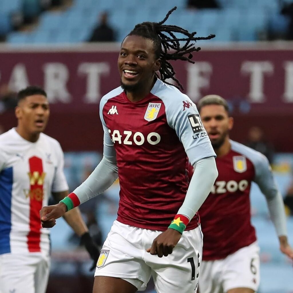 Bertrand Traore celebrating a past goal for Aston Villa. Aston Villa are contenders in the EPL title race.