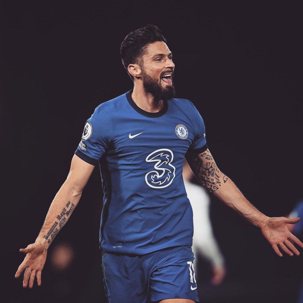 Olivier Giroud celebrating his headed goal vs Aston Villa. The results leave Chelsea and Aston Villa tied at 26 points.