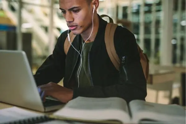 A student focused to complete their assignment 