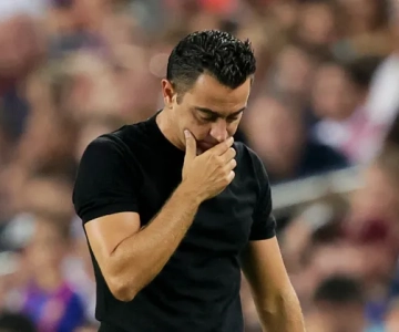 Distraught Xavi following Barca's elimination from the Champions League