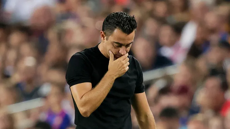 Distraught Xavi following Barca's elimination from the Champions League