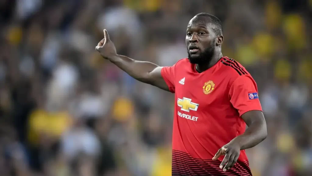 Big Rom featuring for Manchester United. He went on to receive a great deal of cyber bullying as a Manchester United player.