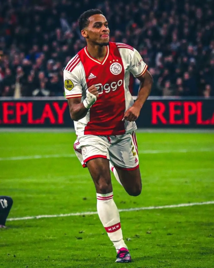 Jurrien Timber celebrating a past goal with Ajax at the Johann Cruyff Arena. The defender would be excited to link up with Lisandro Martinez again. 